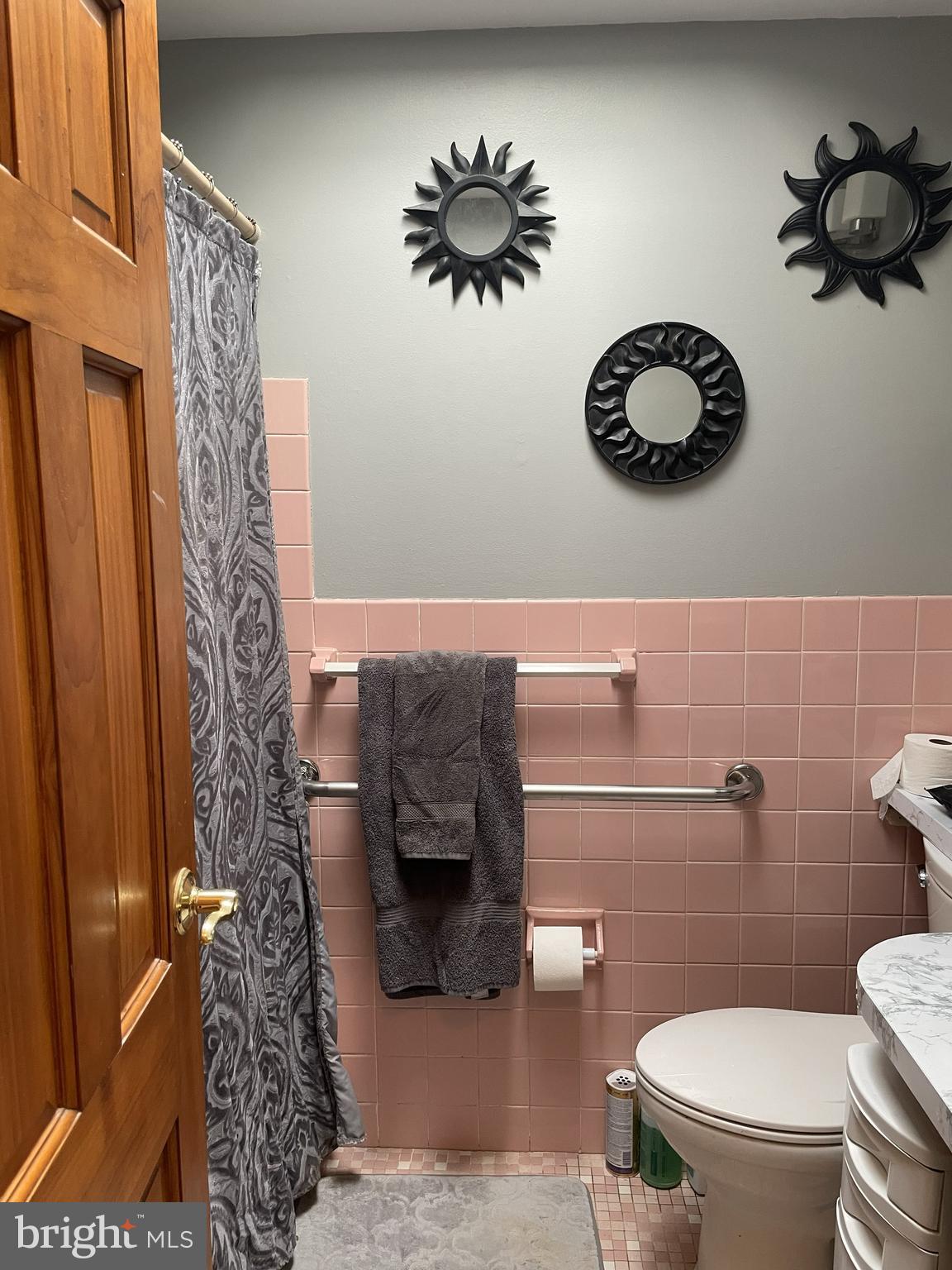12663 Dunks Ferry Road Philadelphia, PA 19154 - Photo 12 of 22 a bathroom with a toilet and a shower curtain