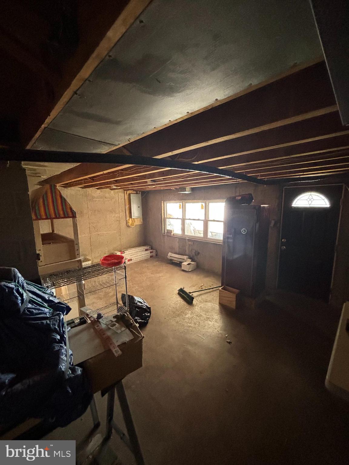 12663 Dunks Ferry Road Philadelphia, PA 19154 - Photo 15 of 22 a gym with water heater and wooden cabinets