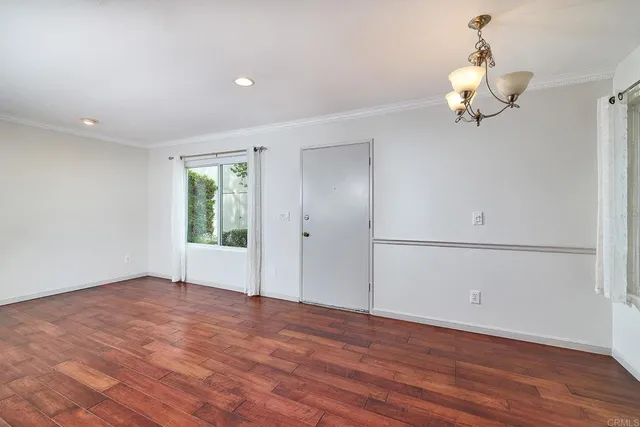 a view of a livingroom with wooden floor