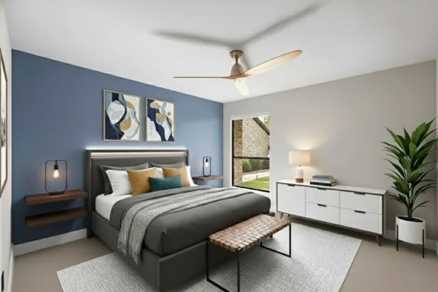 a bedroom with a bed potted plant with the outer view