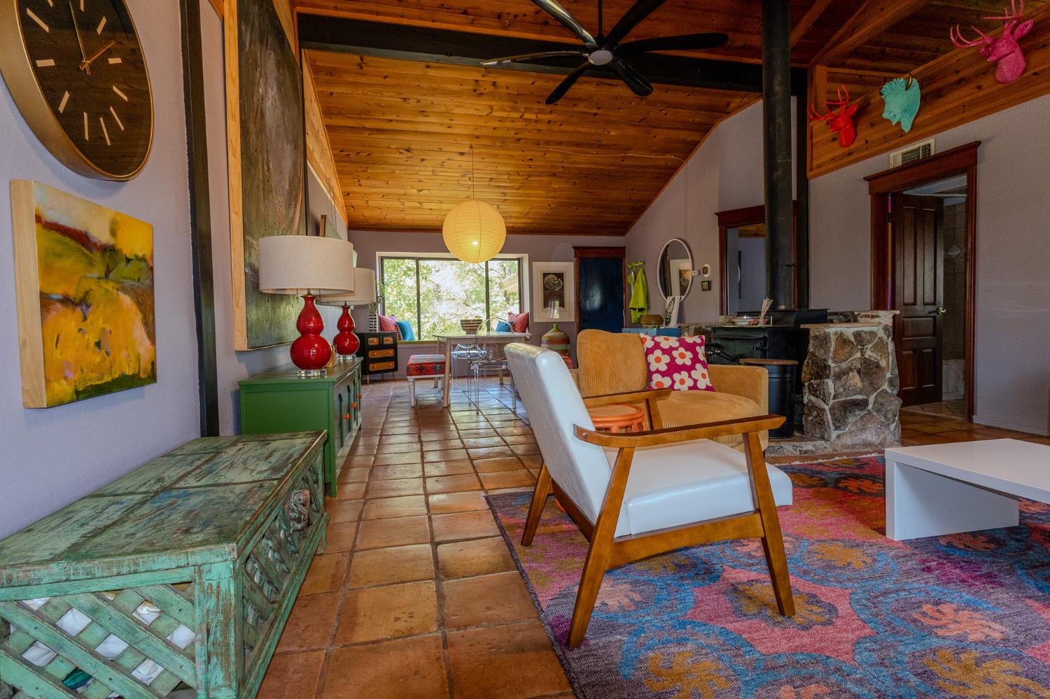 27689 Table Meadow Road Auburn, CA 95602 - Photo 43 of 72 a living room with patio furniture and a fireplace