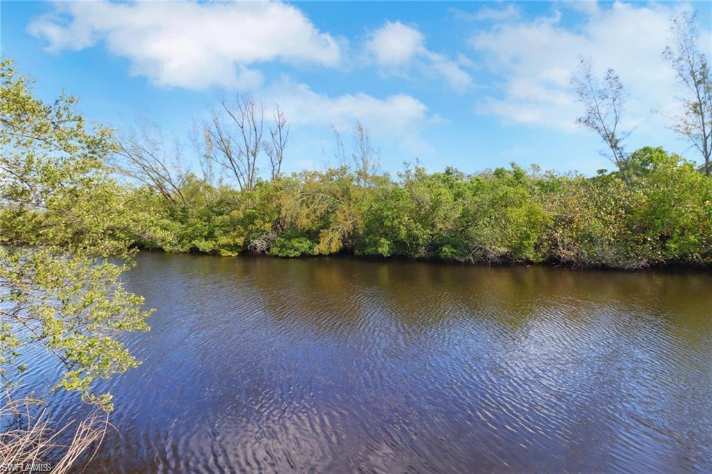 2447 Harbor Road Naples, FL 34104 - Photo 6 of 10 a view of lake background