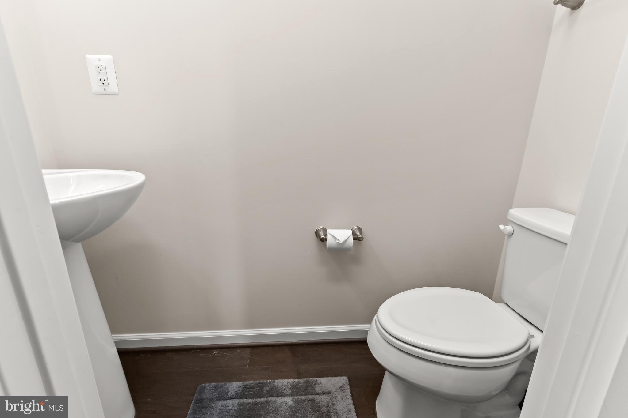 14311 Ridge View Lane Laurel, MD 20707 - Photo 12 of 29 a bathroom with a sink and a toilet