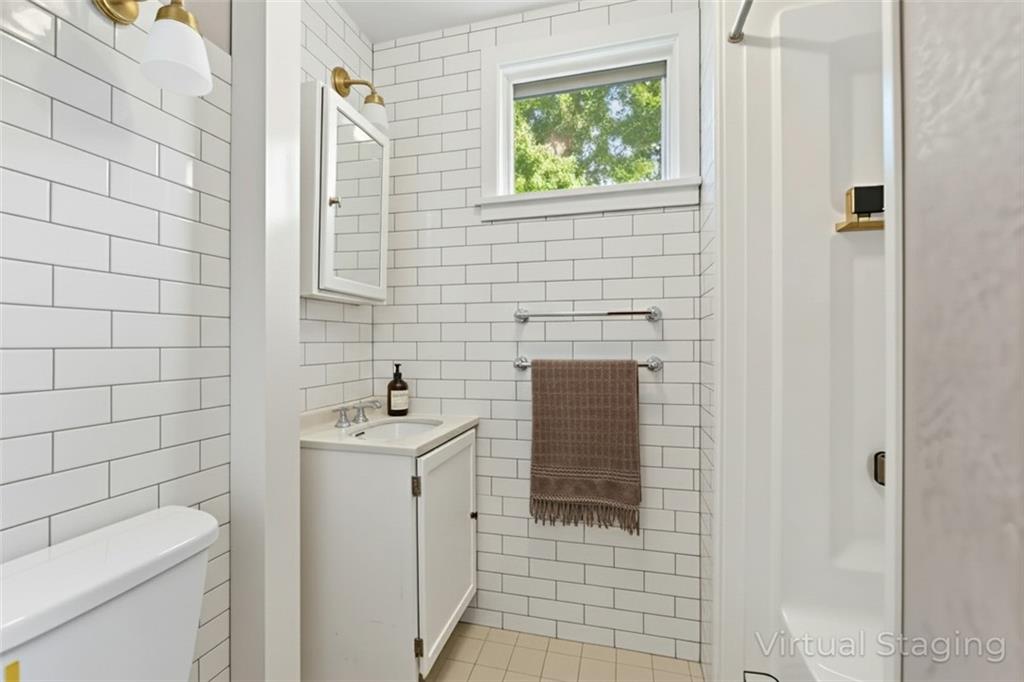 120 Grohman Road Butler, PA 16002 - Photo 18 of 28 a bathroom with a sink toilet and shower