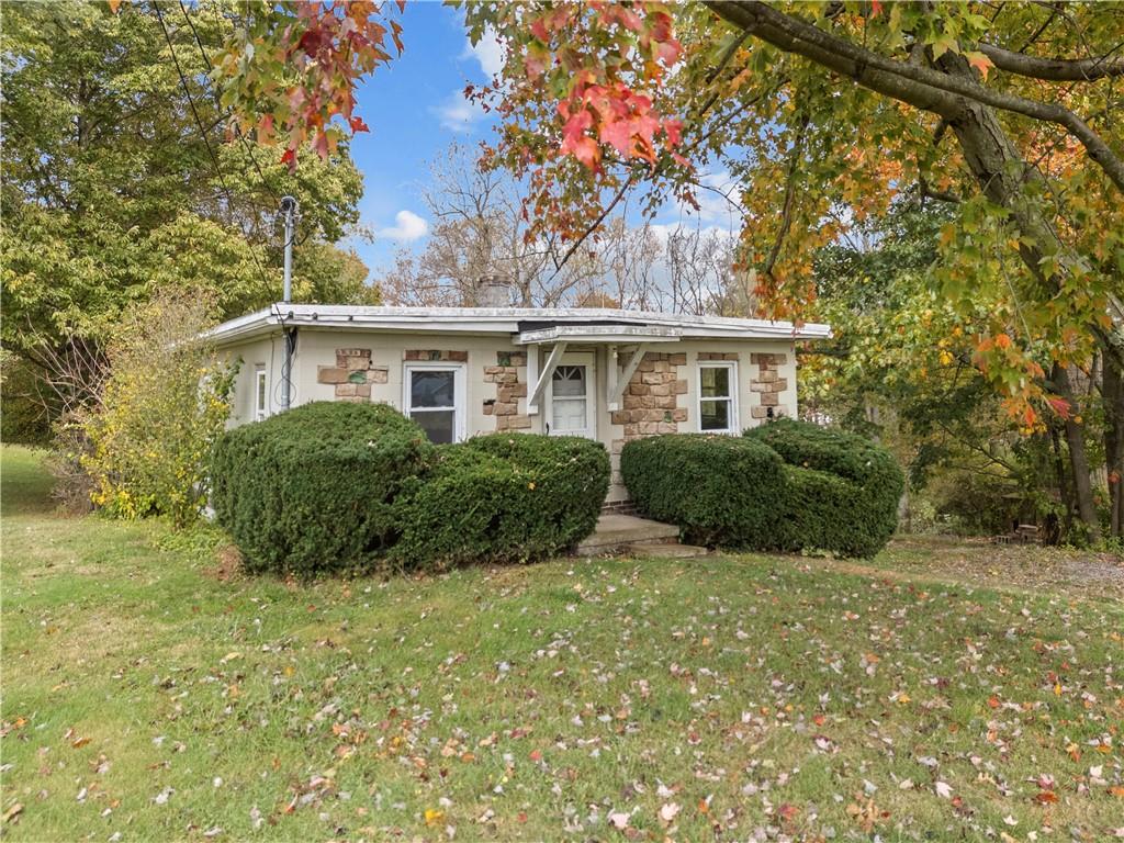 120 Grohman Road Butler, PA 16002 - Photo 2 of 28 a view of backyard with a garden and plants
