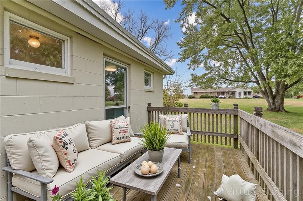 120 Grohman Road Butler, PA 16002 - Photo 24 of 28 a view of a deck with couches and large trees