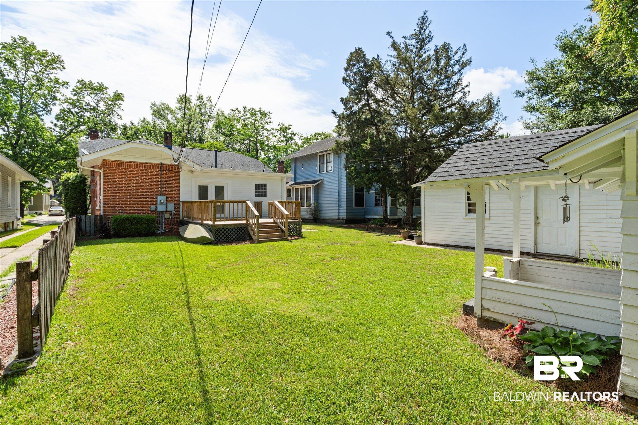 24 Macy Place Mobile, AL 36604 - Photo 32 of 38 View of yard featuring a wooden deck