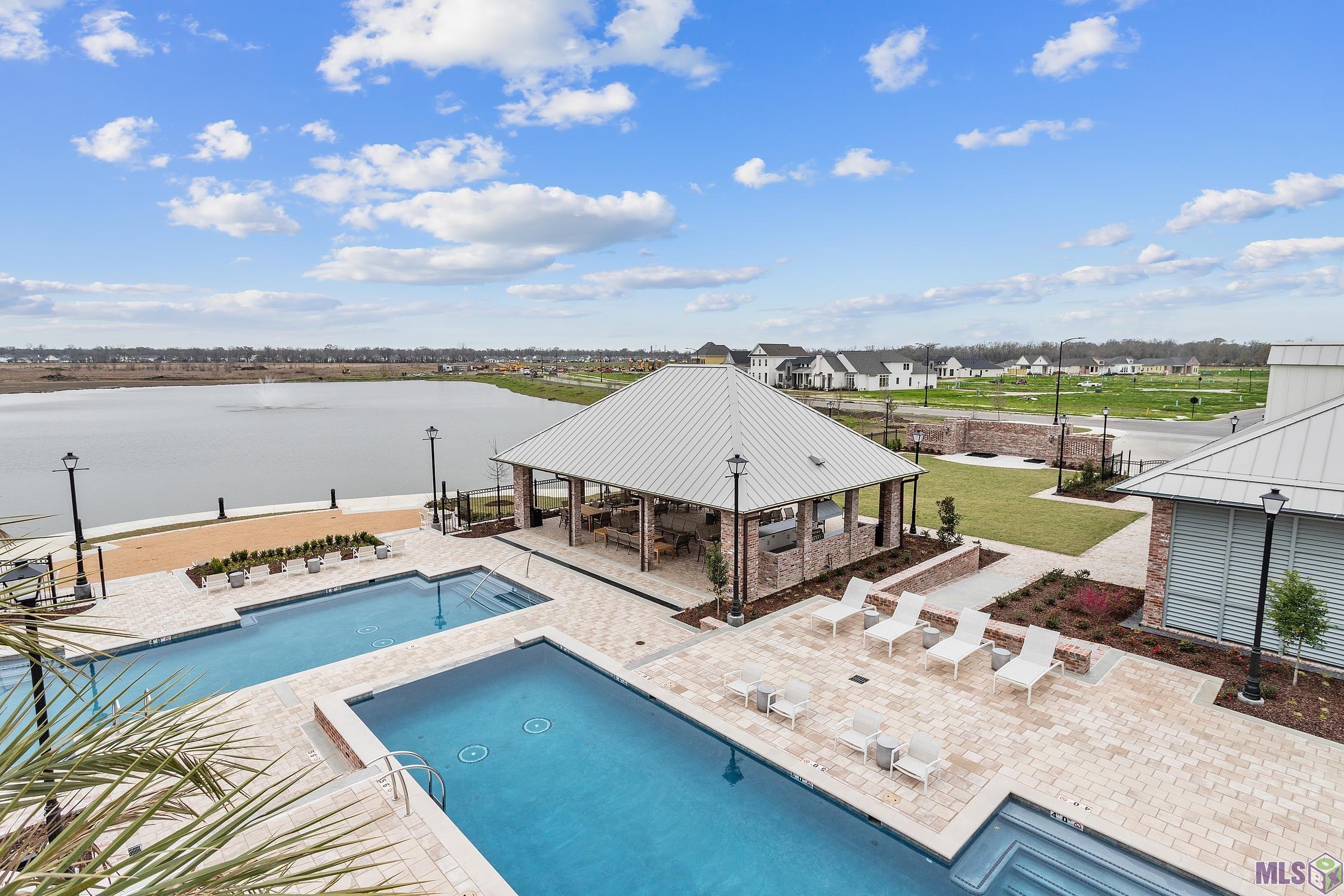 13807 Golden Holly Lane Baton Rouge, LA 70810 - Photo 2 of 4 Community pools and pavilion area