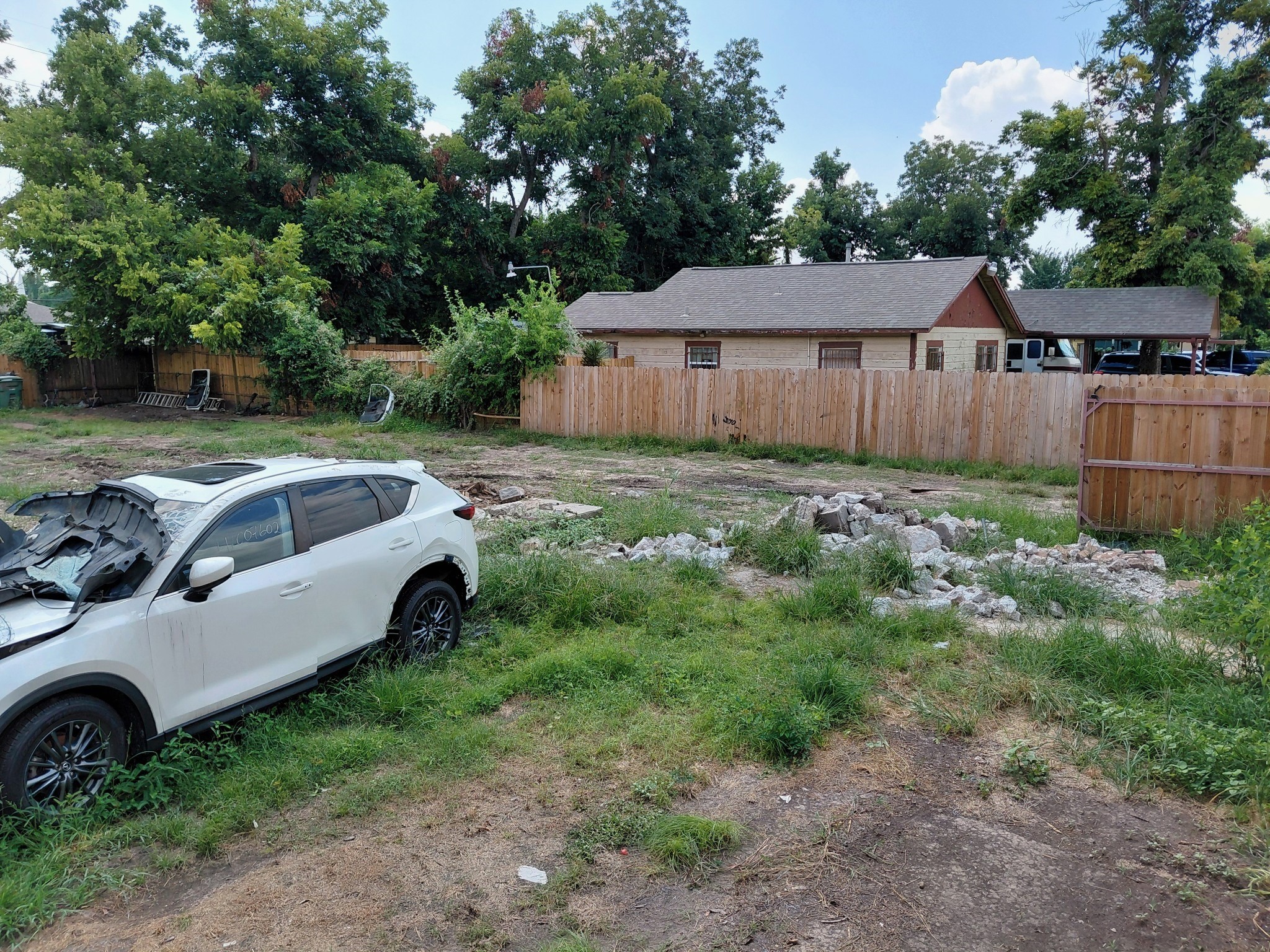 3210 Oklahoma Street Houston, TX 77093 - Photo 6 of 8 a front view of a house with garden