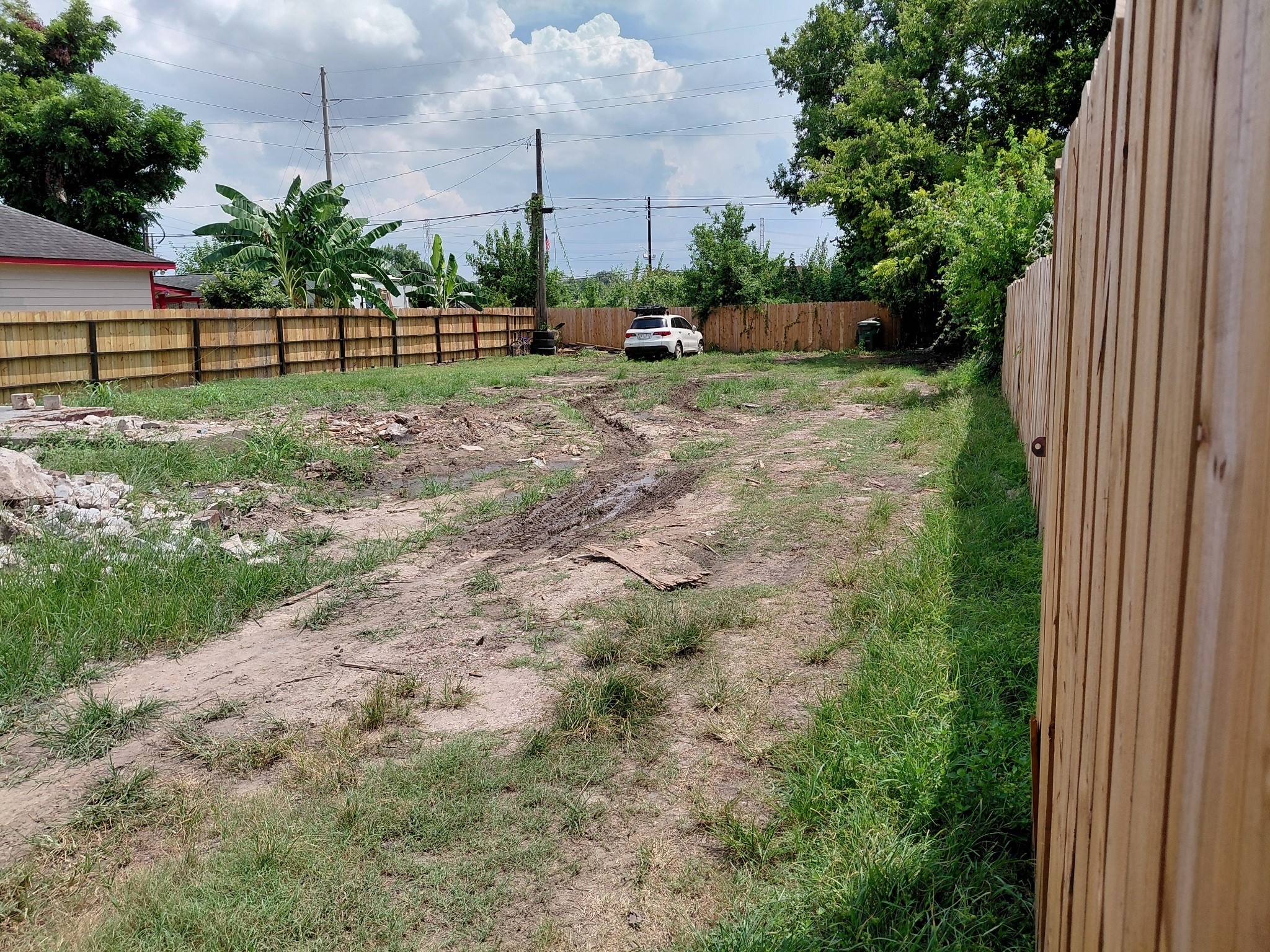 3210 Oklahoma Street Houston, TX 77093 - Photo 8 of 8 a view of a yard with a slide