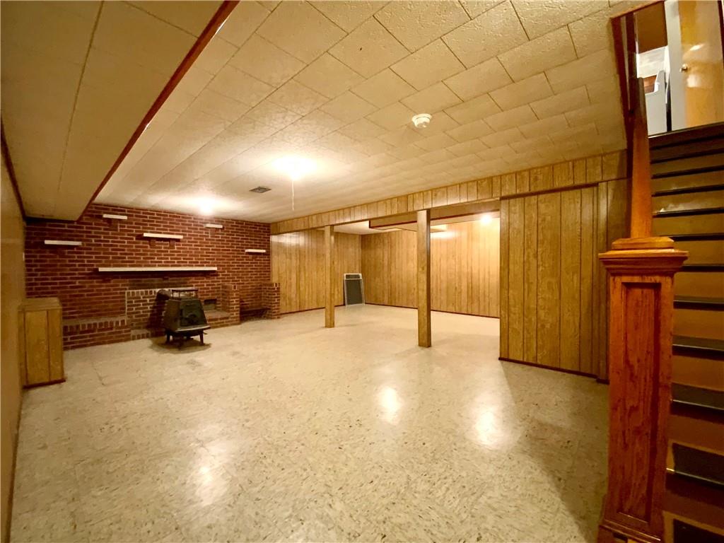 204 Hall Road Aliquippa, PA 15001 - Photo 21 of 30 Finished game room with a wood stove