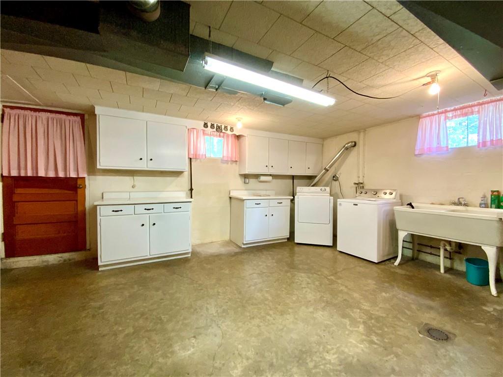 204 Hall Road Aliquippa, PA 15001 - Photo 23 of 30 Large laundry area with a walk out to the back yard