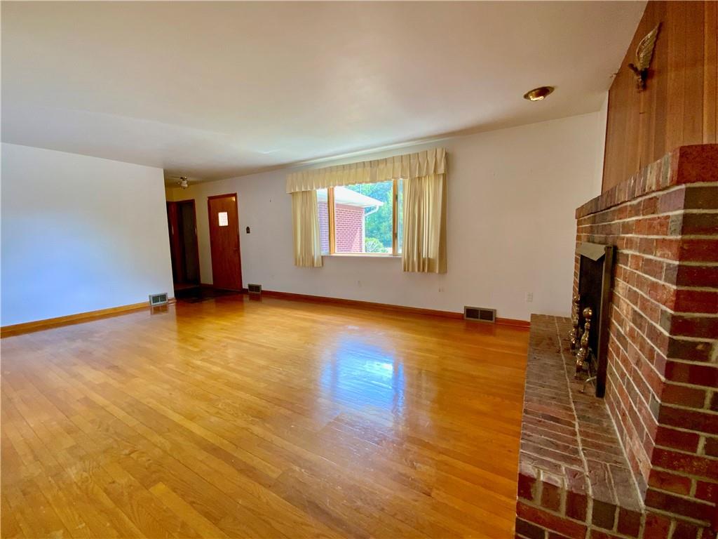 204 Hall Road Aliquippa, PA 15001 - Photo 5 of 30 Original hardwood throughout the living room and dining room