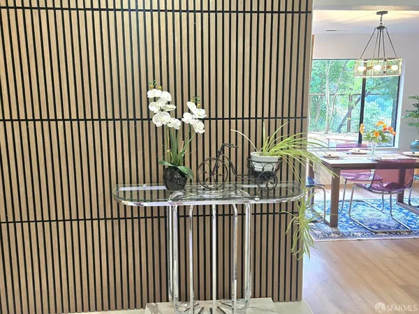 a view of entryway with wooden floor