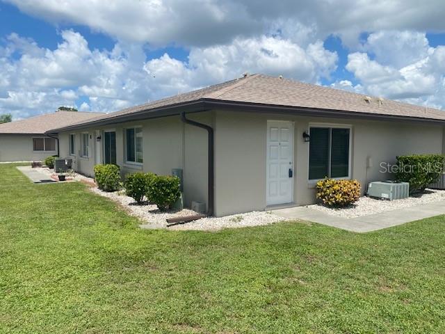 a house view with a garden space