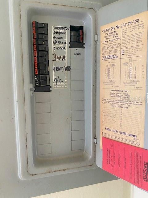 21150 Gertrude Avenue, Unit R1 Port Charlotte, FL 33952 - Photo 17 of 18 a bathroom with a shower