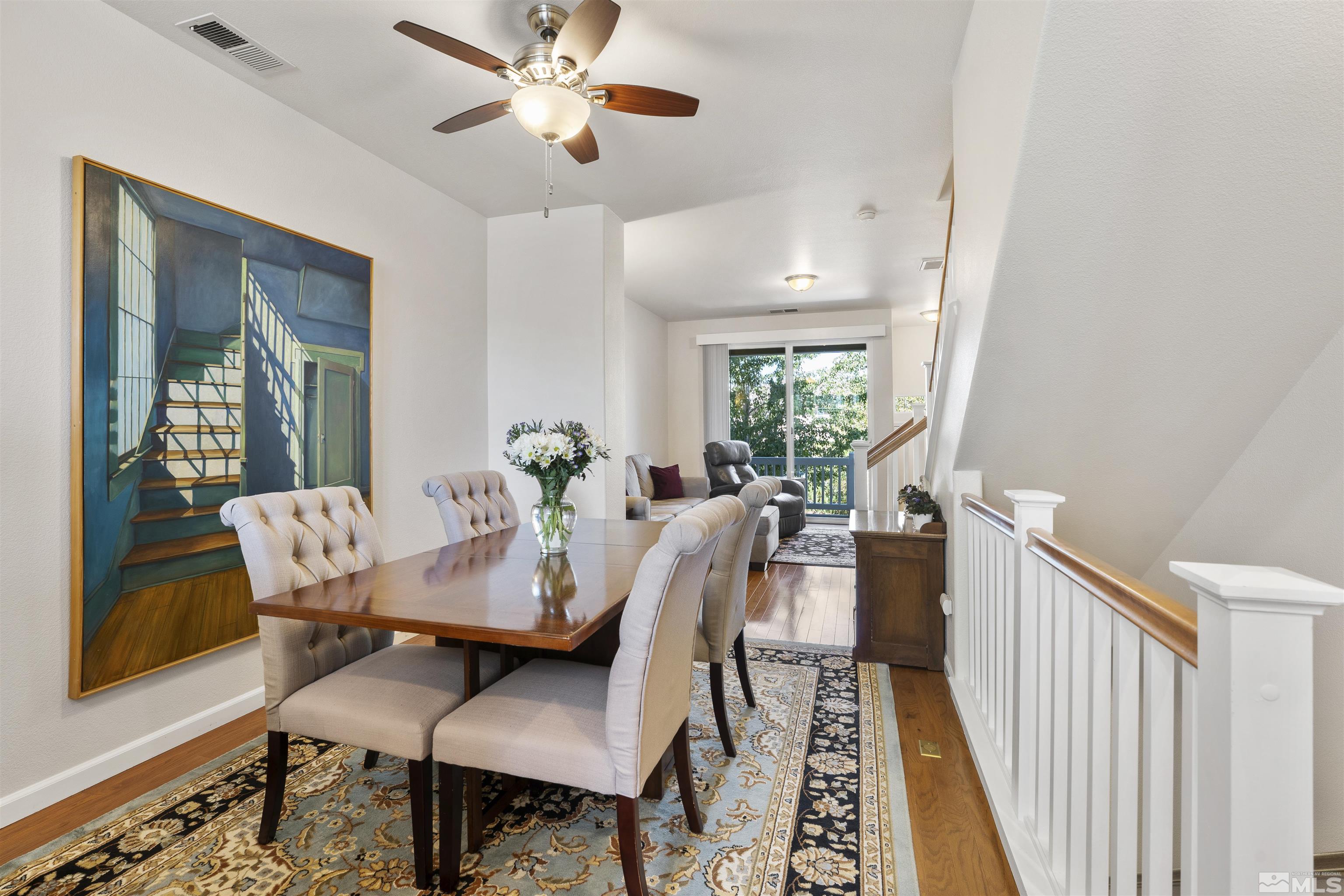 2212 Grosvenor Reno, NV 89509 - Photo 12 of 36 a view of a dining room with furniture window and wooden floor