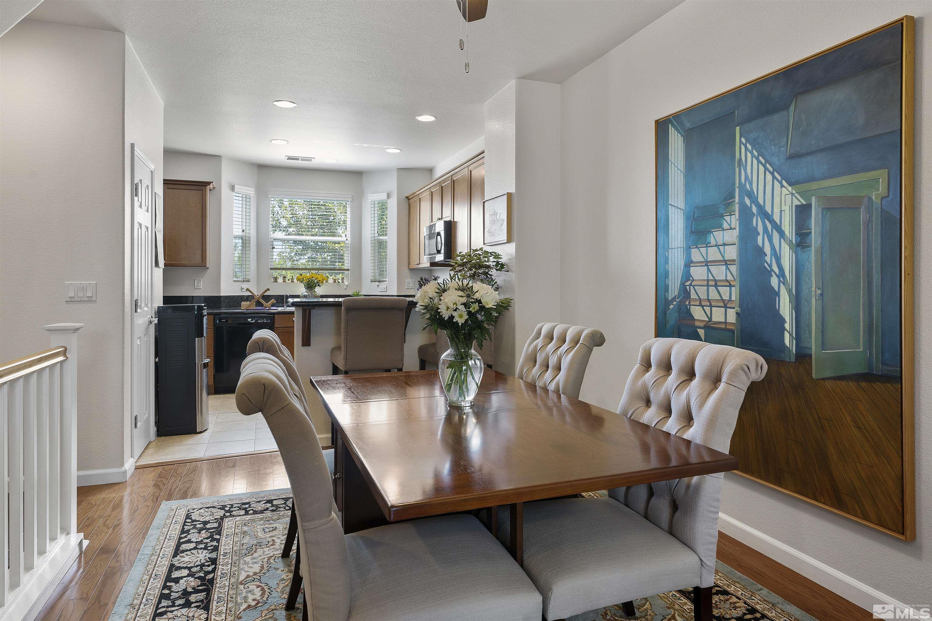 2212 Grosvenor Reno, NV 89509 - Photo 13 of 36 a view of a dining room with furniture window and wooden floor