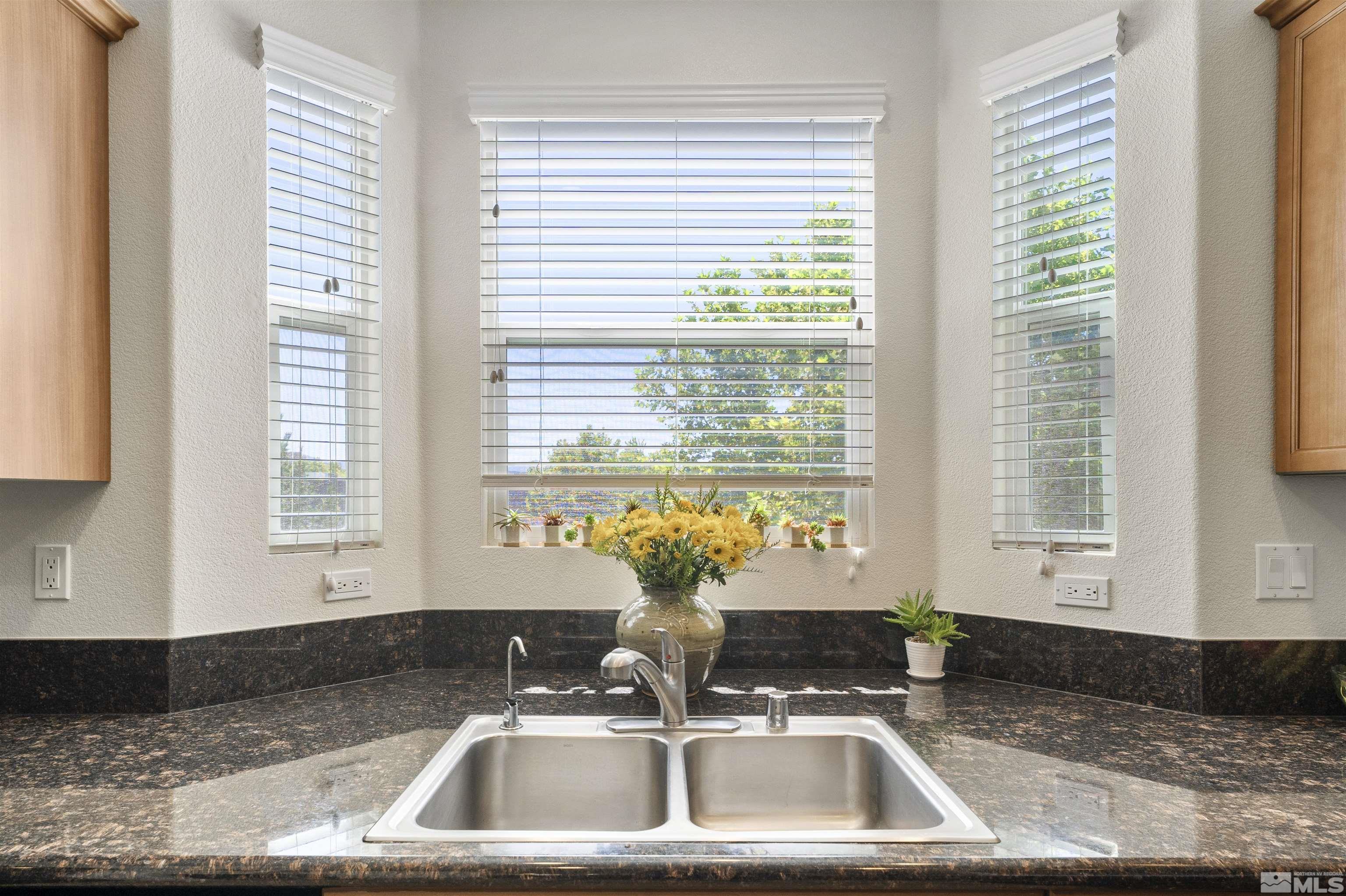 2212 Grosvenor Reno, NV 89509 - Photo 21 of 36 a kitchen with a sink and a window