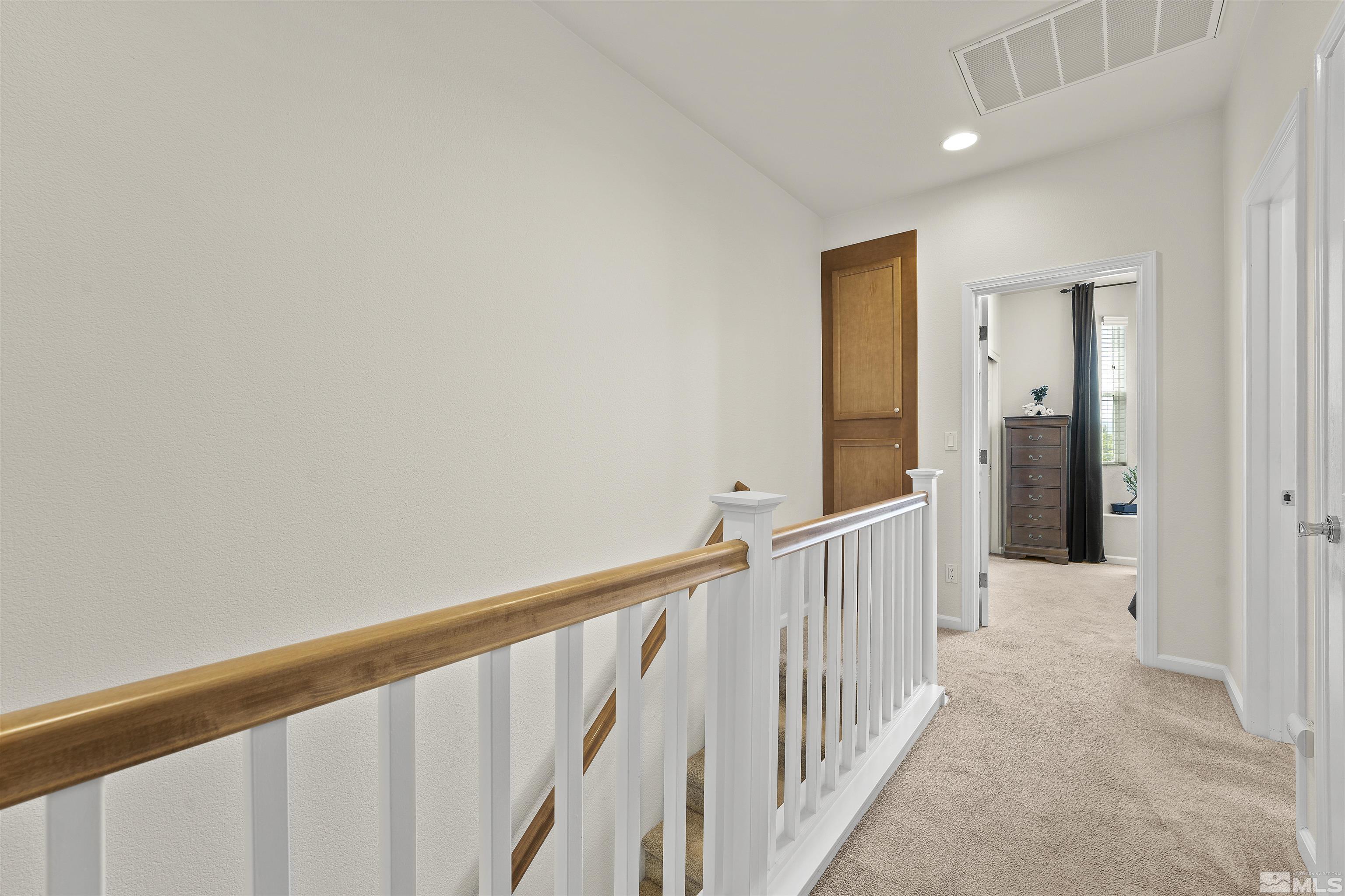 2212 Grosvenor Reno, NV 89509 - Photo 23 of 36 a view of a hallway with wooden floor and entryway