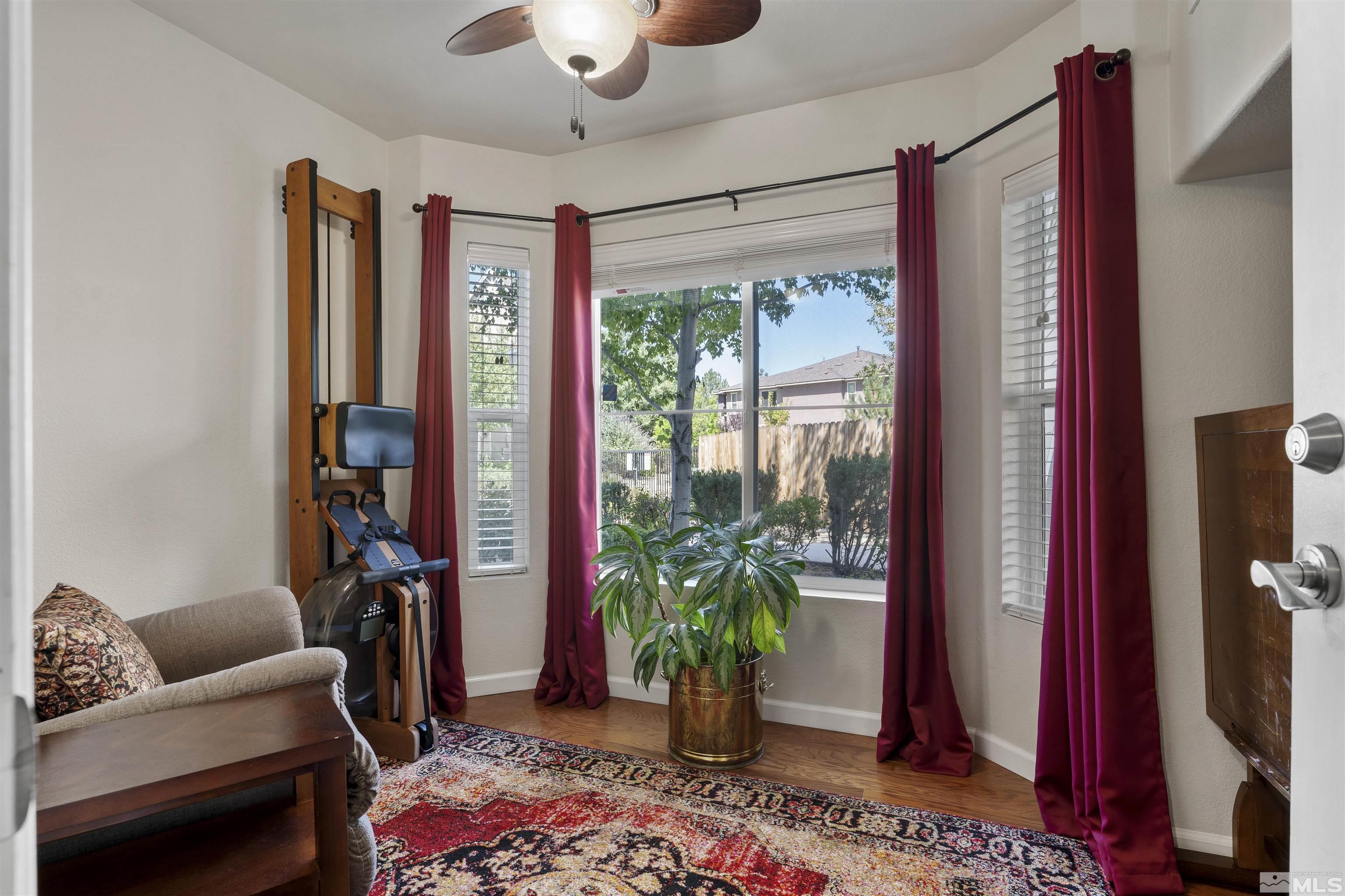 2212 Grosvenor Reno, NV 89509 - Photo 33 of 36 a living room with furniture and a potted plant