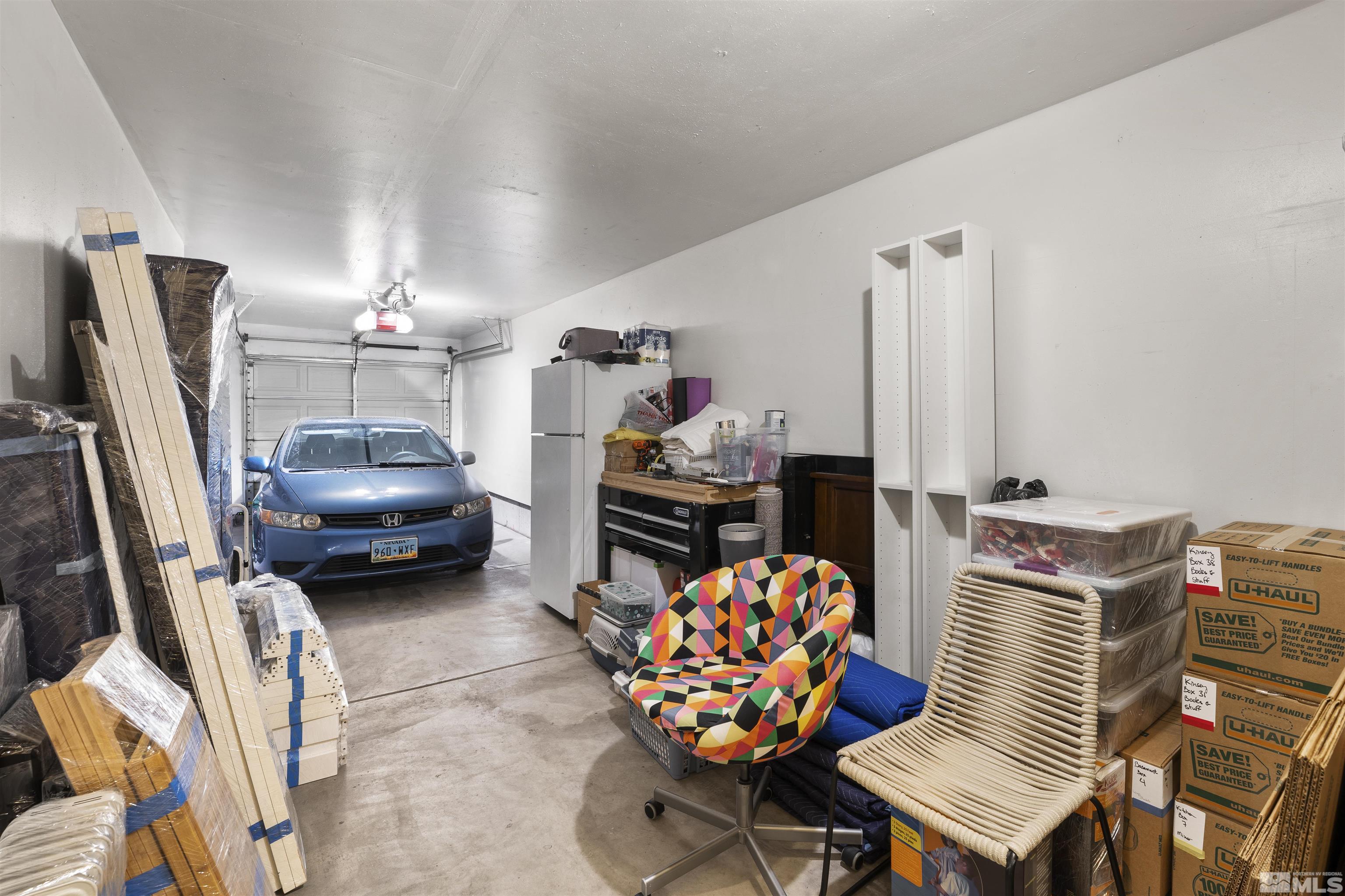 2212 Grosvenor Reno, NV 89509 - Photo 35 of 36 a bedroom with furniture and a flat screen tv