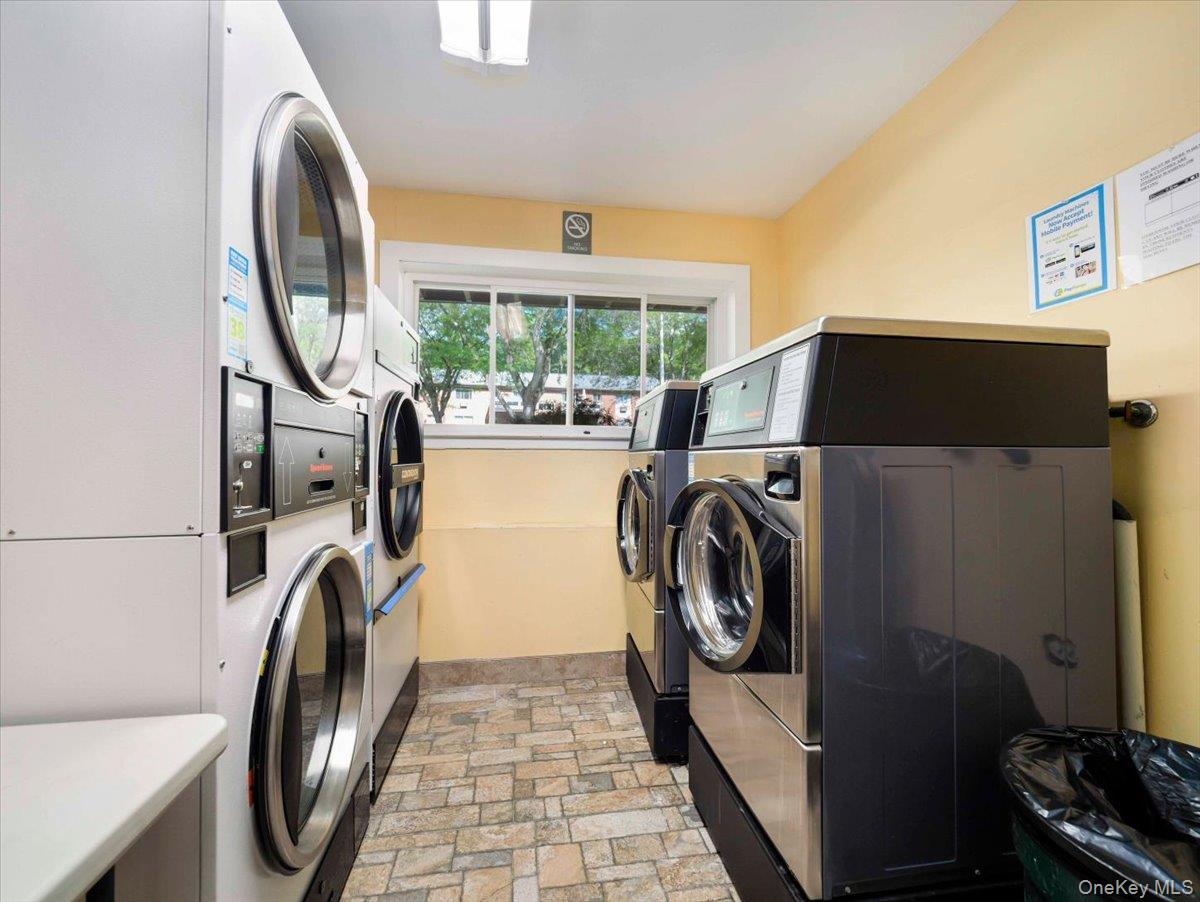 27 Tanager Road, Unit 2702 Monroe, NY 10950 - Photo 31 of 35 Laundry room with commercial-grade washing machines and dryers