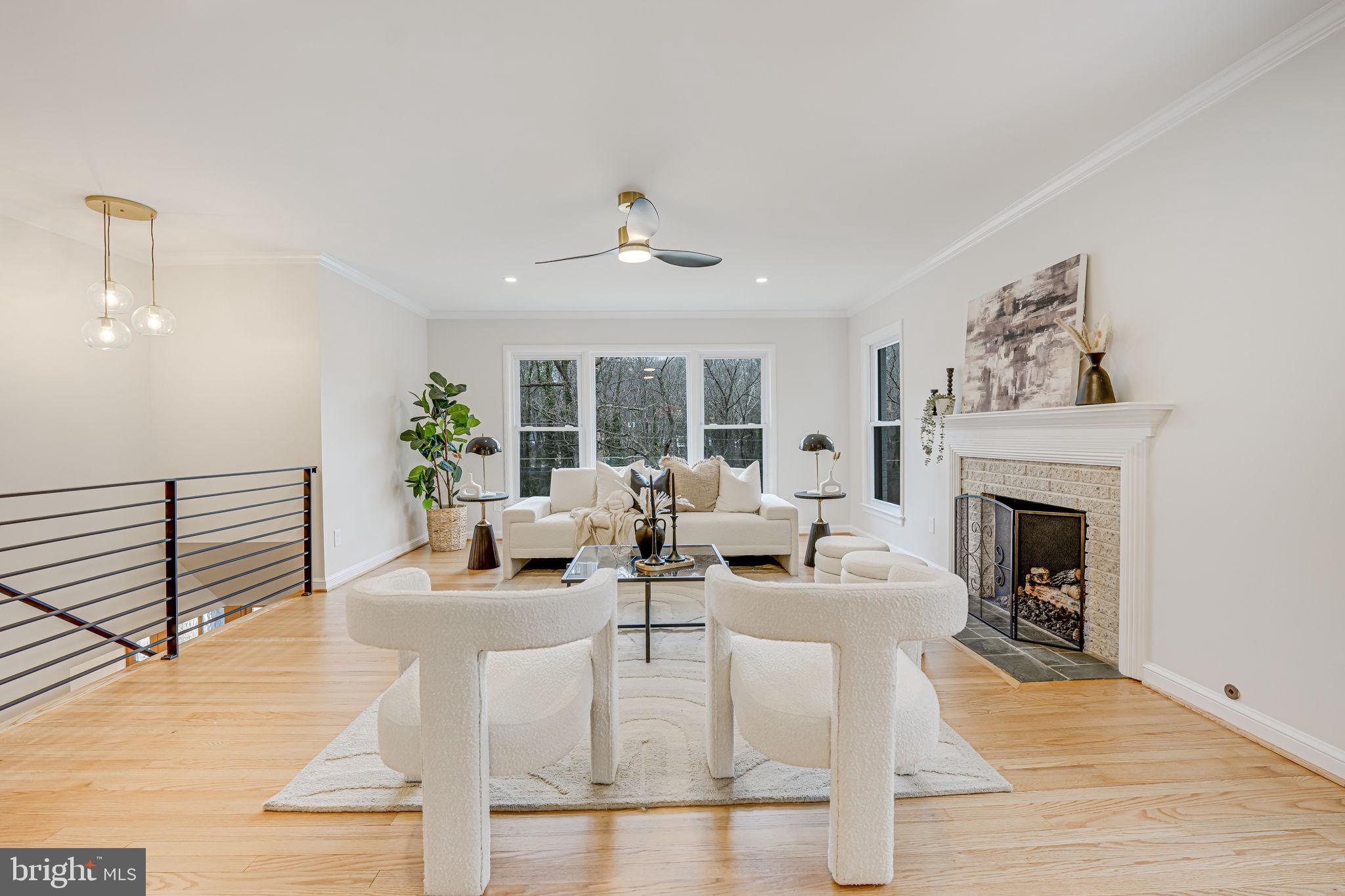 7401 Fort Hunt Road Alexandria, VA 22307 - Photo 7 of 56 a living room with fireplace furniture and a fireplace