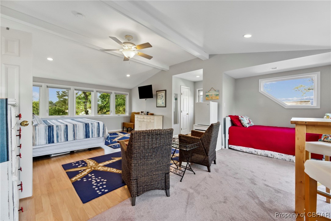 298 Old Ferry Road Hudgins, VA 23076 - Photo 23 of 48 Bedroom featuring lofted ceiling with beams, wood finished floors, ceiling fan, and recessed lighting