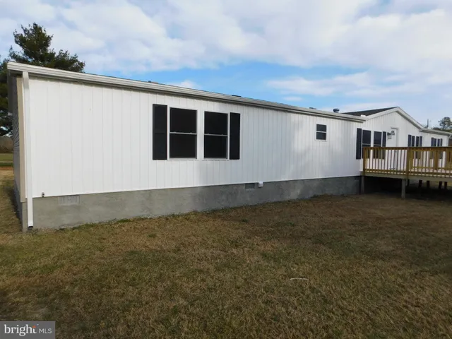 a house view with a backyard space