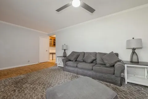 a living room with furniture and a couch