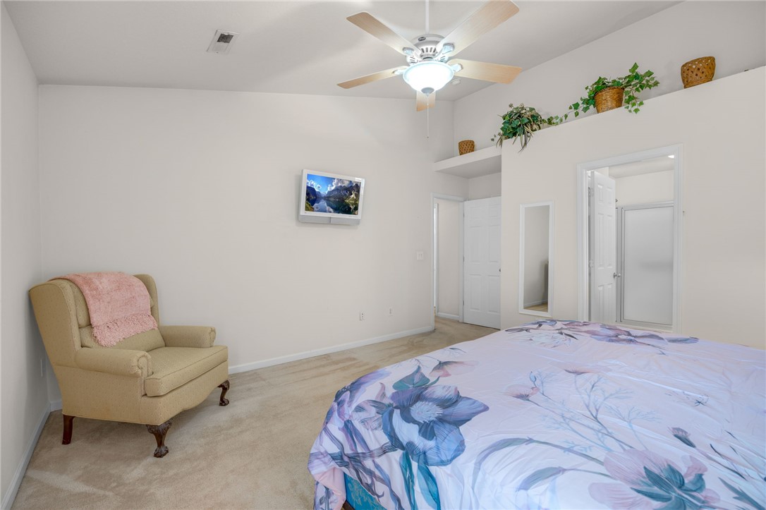 125 Patagonia Road Anderson, SC 29625 - Photo 14 of 36 Vaulted ceilings and neutral carpet floor define this serene bedroom space.