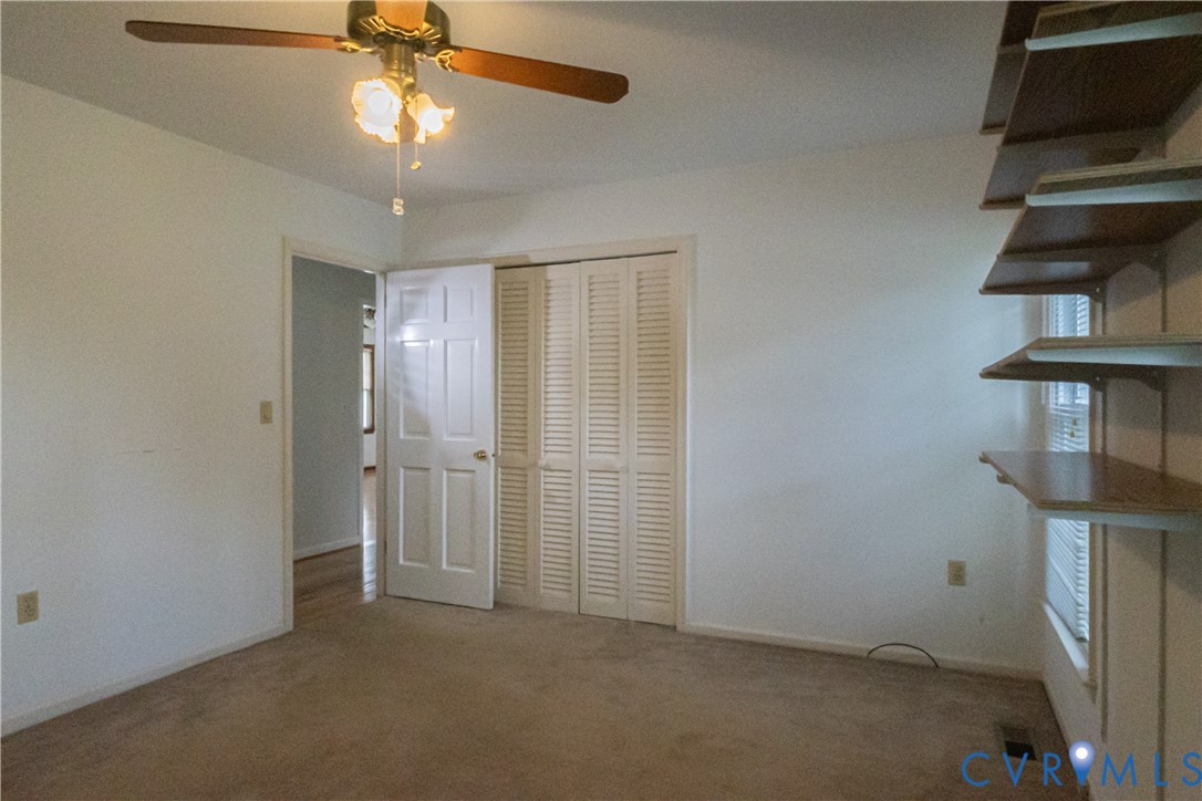 309 Old Plank Road Kenbridge, VA 23944 - Photo 33 of 45 Ceiling fan with light fixture, carpeted flooring,