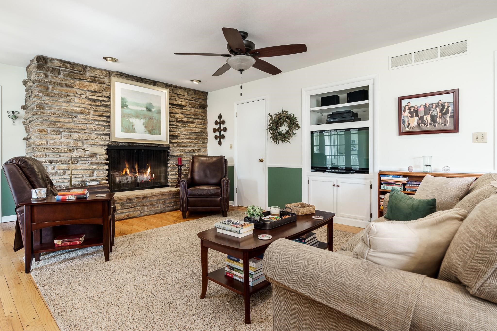 3523 North View Road Rockford, IL 61107 - Photo 15 of 59 a living room with furniture fireplace and flat screen tv