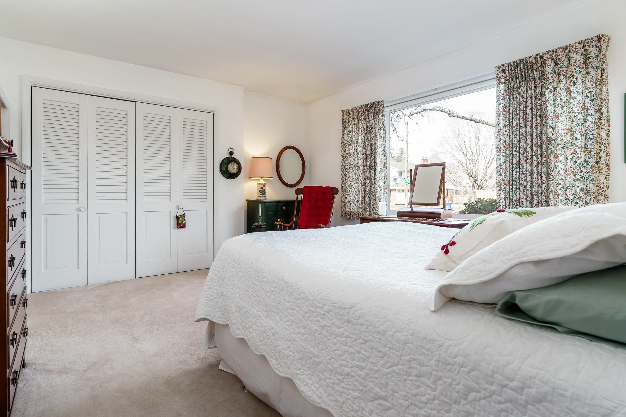 3523 North View Road Rockford, IL 61107 - Photo 27 of 59 a bedroom with a bed a closet and a large window