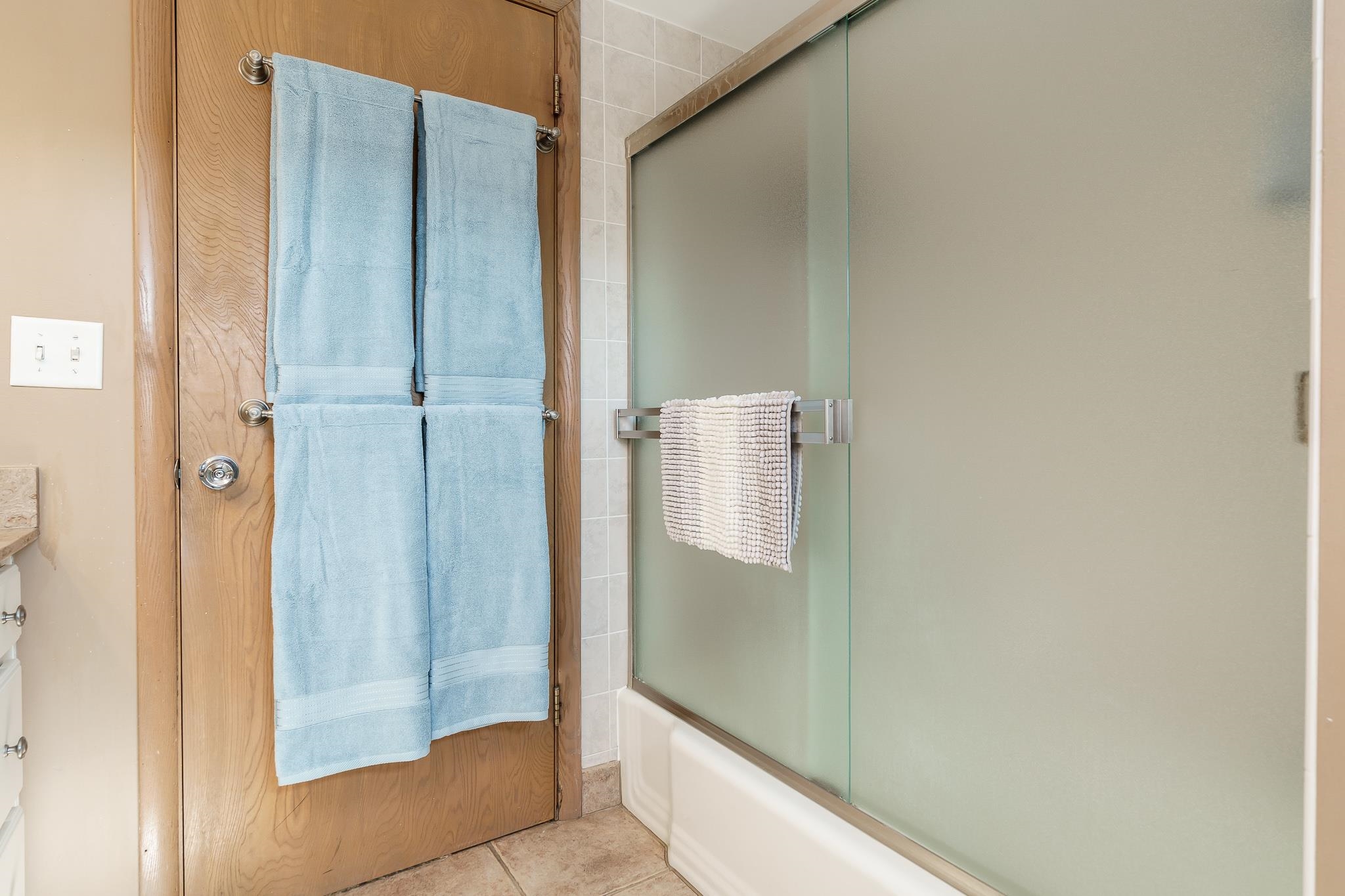 3523 North View Road Rockford, IL 61107 - Photo 36 of 59 a bathroom with a shower and toilet