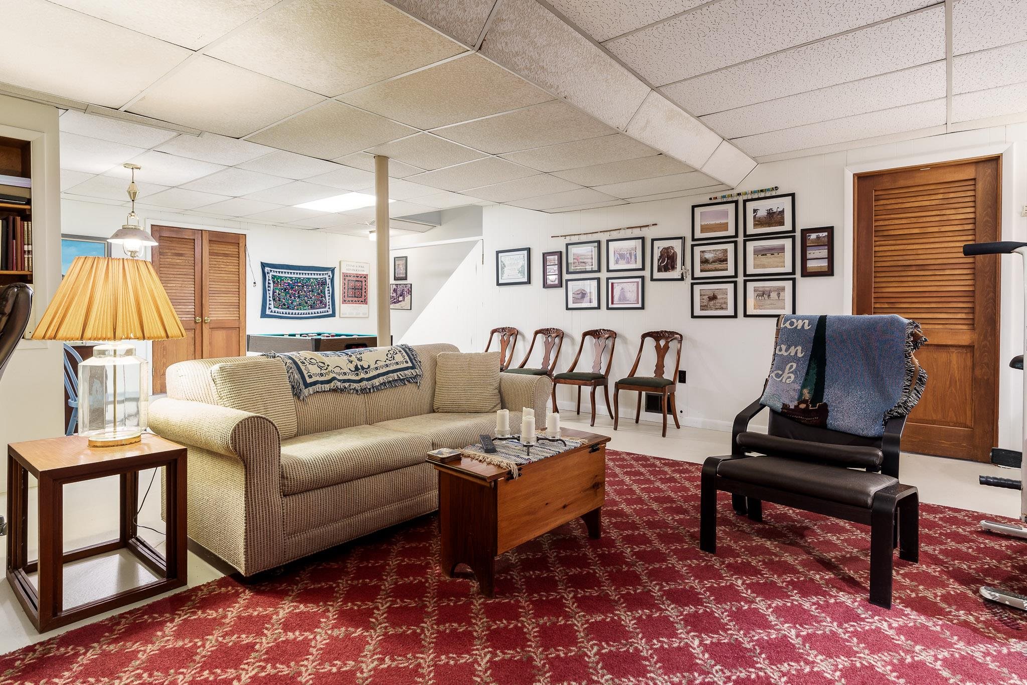 3523 North View Road Rockford, IL 61107 - Photo 45 of 59 a living room with furniture and a rug