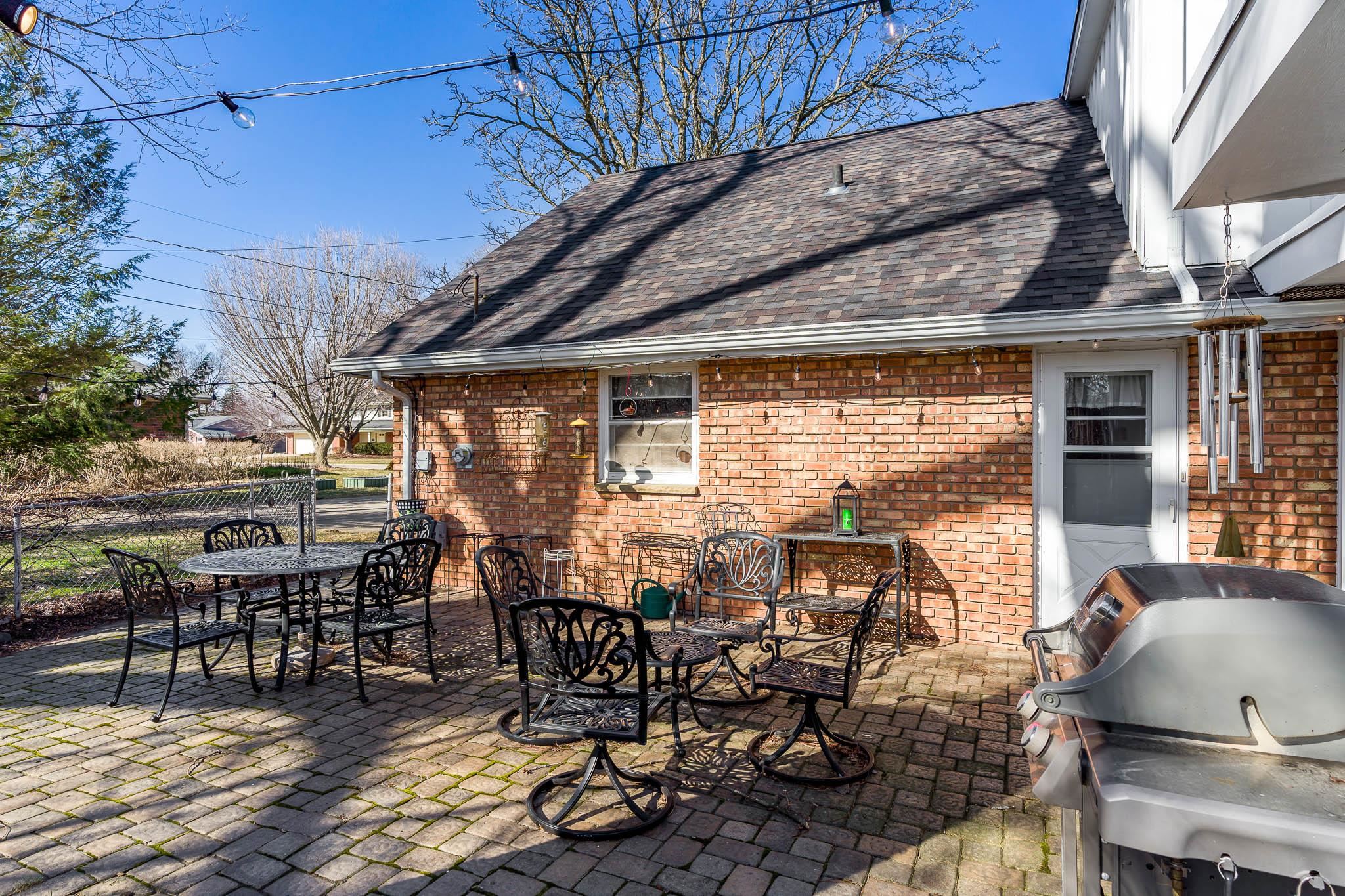 3523 North View Road Rockford, IL 61107 - Photo 51 of 59 a view of a patio with table and chairs and potted plants