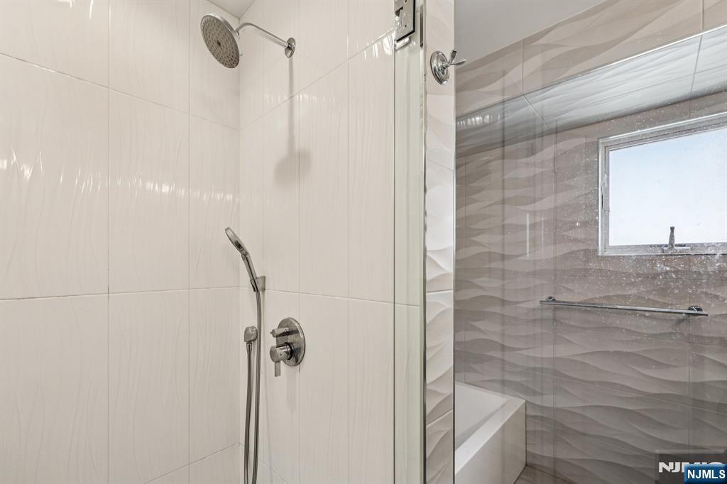 746 Undercliff Avenue, Unit B Edgewater, NJ 07020 - Photo 26 of 50 a bathroom with a shower