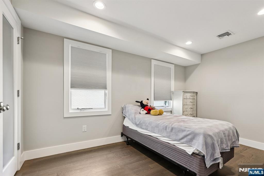 746 Undercliff Avenue, Unit B Edgewater, NJ 07020 - Photo 29 of 50 a bedroom with a bed and window