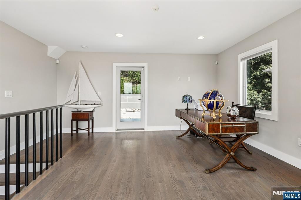 746 Undercliff Avenue, Unit B Edgewater, NJ 07020 - Photo 42 of 50 a view of a room with furniture window and wooden floor