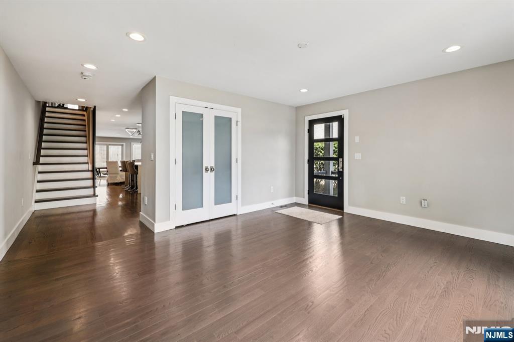 746 Undercliff Avenue, Unit B Edgewater, NJ 07020 - Photo 6 of 50 an empty room with wooden floor and closet