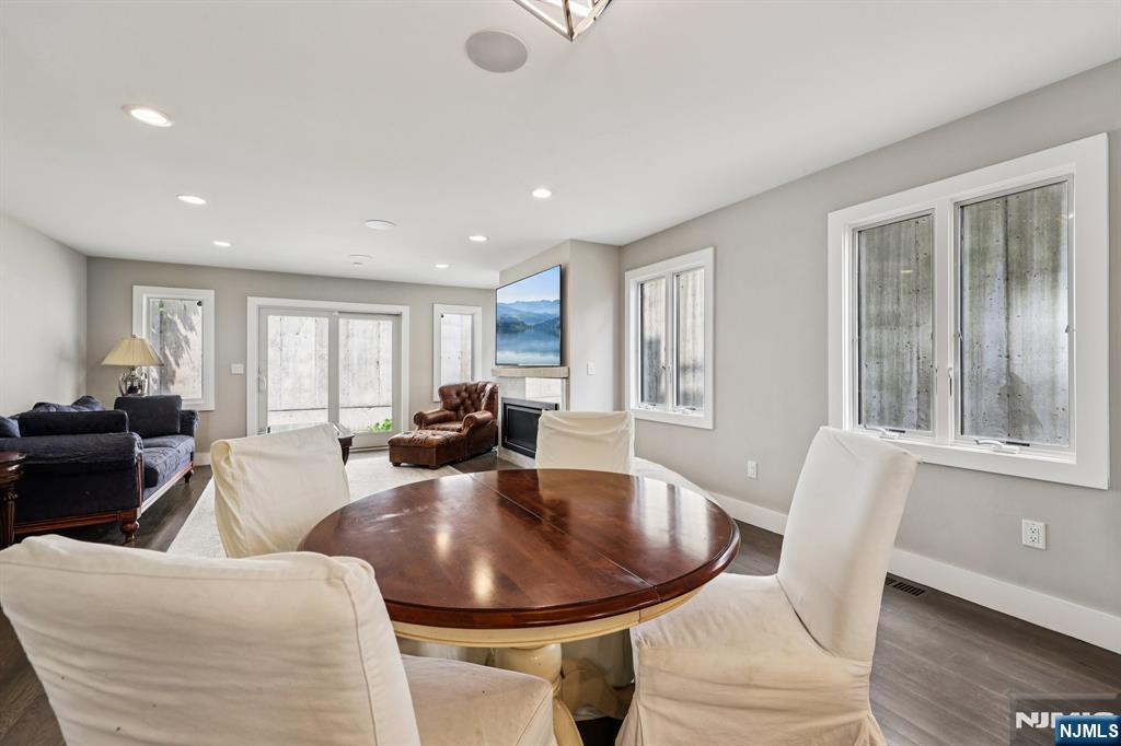 746 Undercliff Avenue, Unit B Edgewater, NJ 07020 - Photo 10 of 50 a living room with furniture a window and a dining table
