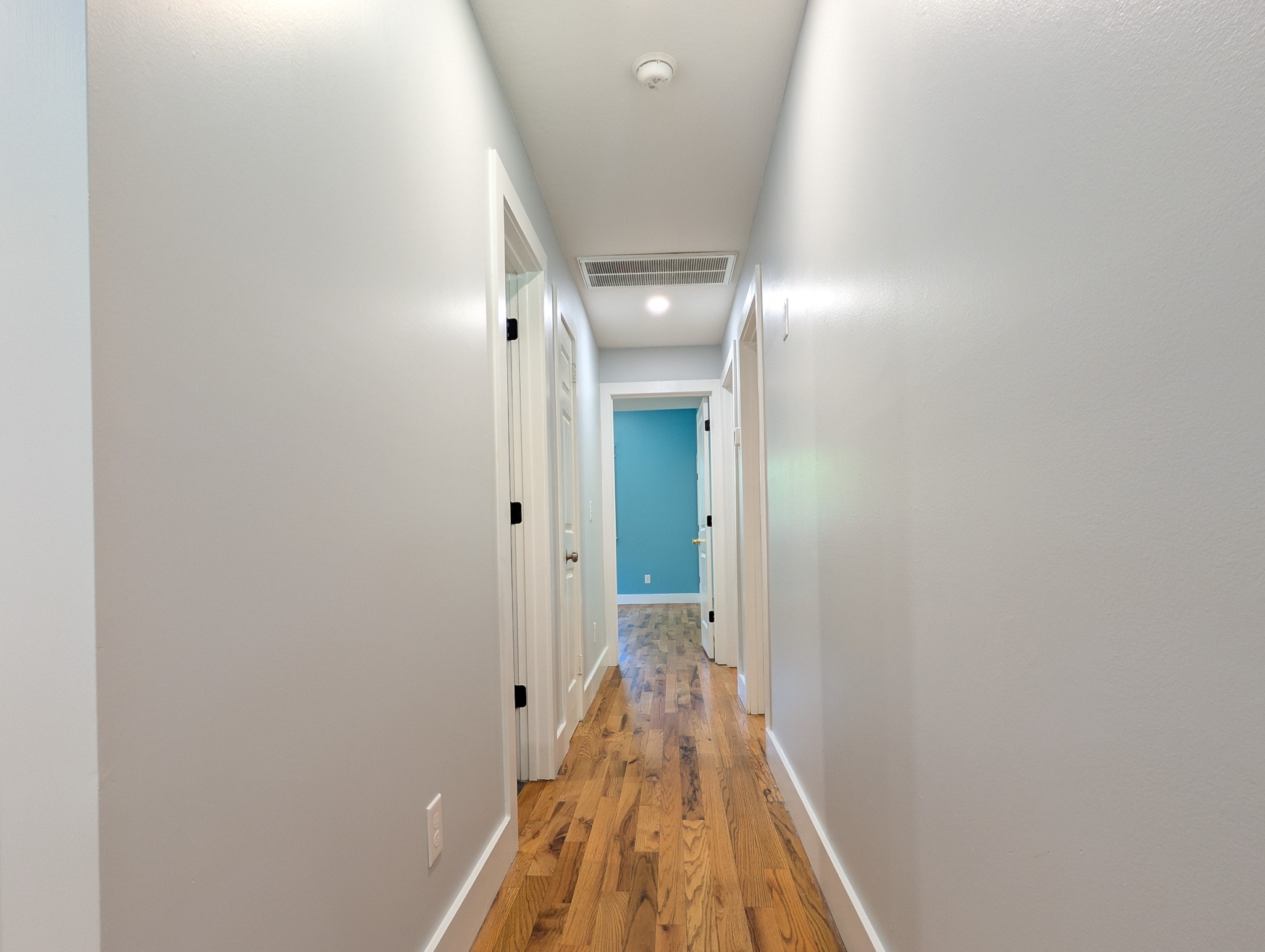 244 Warrior Road Madison, TN 37115 - Photo 9 of 24 a view of a hallway with wooden floor