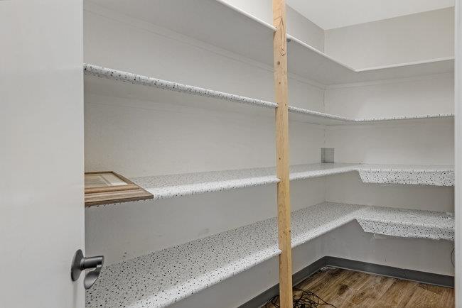 5955 Diablo Hills Road Tres Pinos, CA 95075 - Photo 21 of 91 a view of walk in closet with empty racks