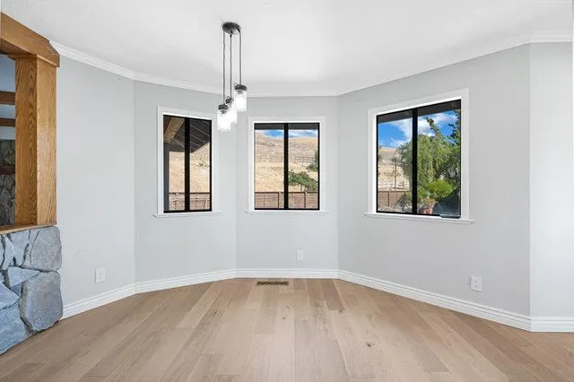 a bathroom with a sink vanity granite and a mirror