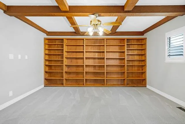 a bathroom with a sink double vanity and a mirror