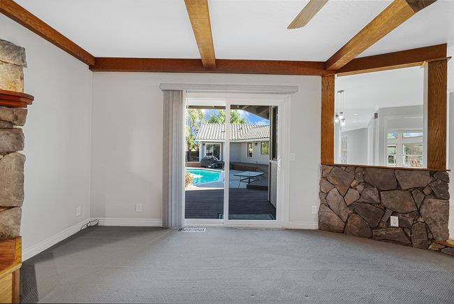5955 Diablo Hills Road Tres Pinos, CA 95075 - Photo 30 of 91 a view of an empty room with a fireplace