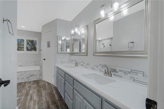 5955 Diablo Hills Road Tres Pinos, CA 95075 - Photo 45 of 91 a bathroom with a sink vanity granite and a mirror