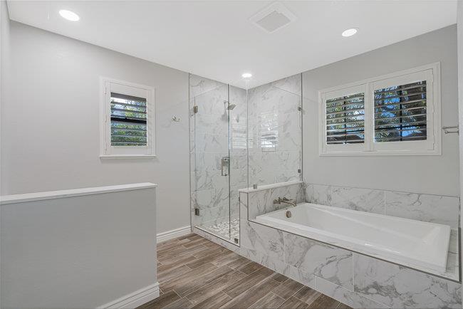 5955 Diablo Hills Road Tres Pinos, CA 95075 - Photo 46 of 91 a spacious bathroom with a granite countertop tub shower sink and mirror